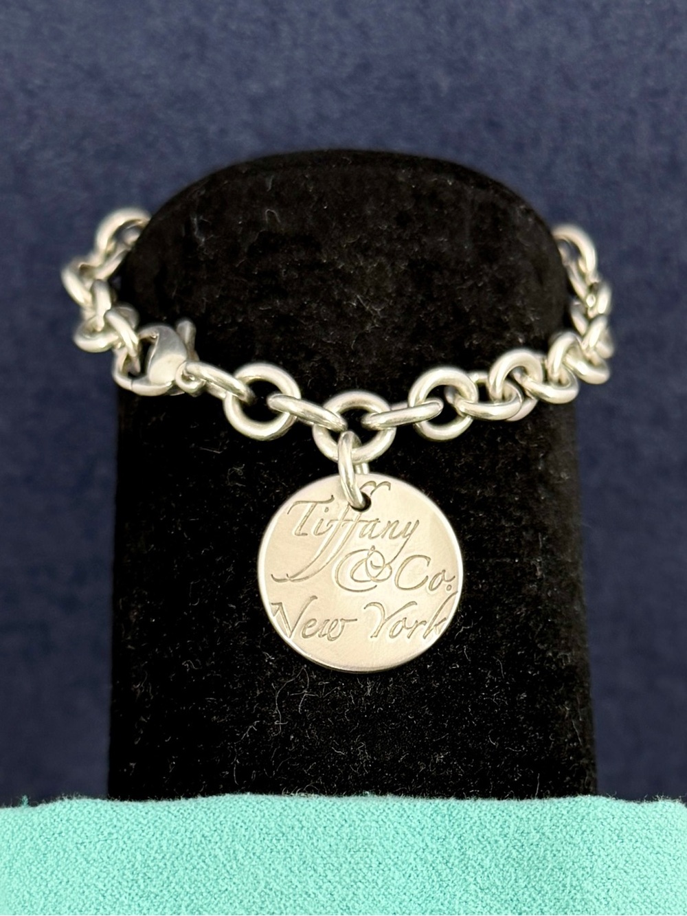 TIFFANY & CO. Sterling Silver Notes New York Round Tag Charm Bracelet; 6.75” COA
